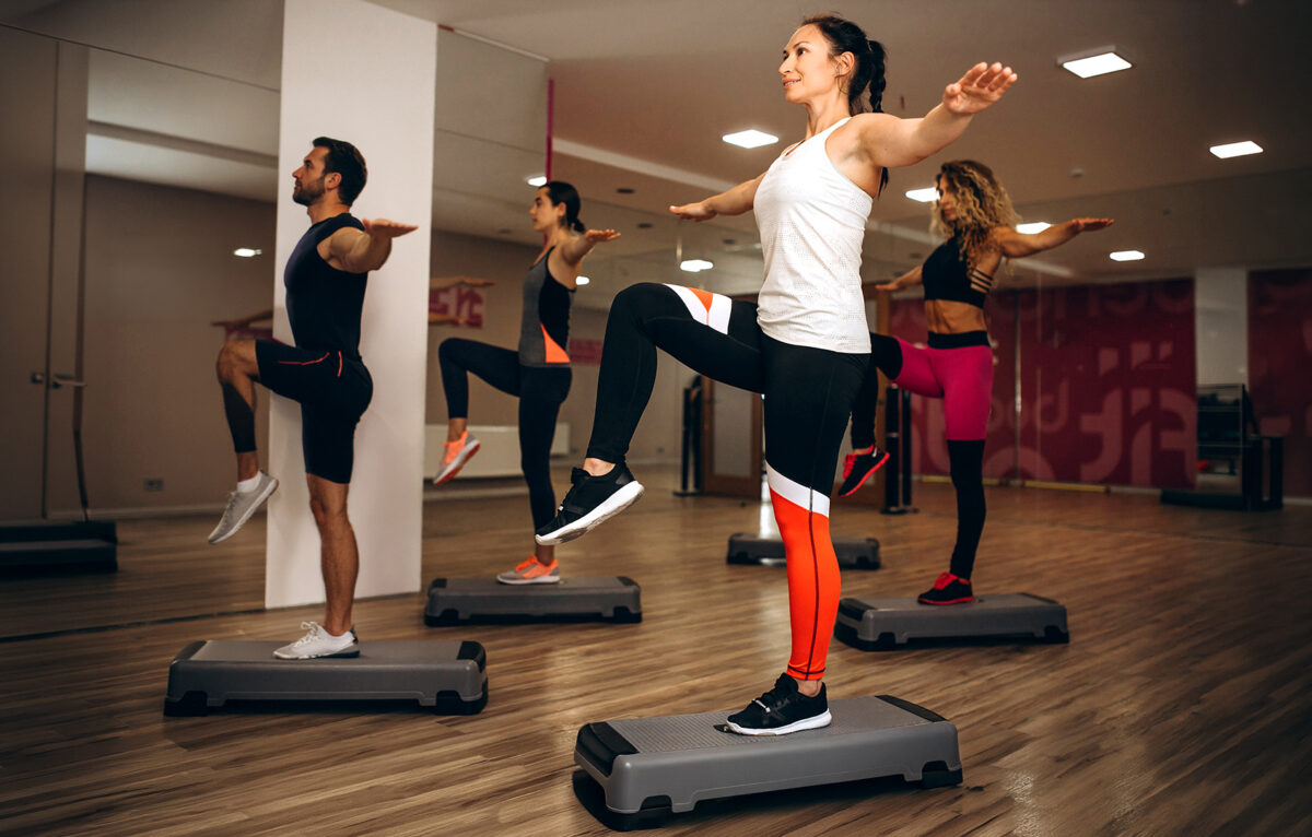 Pilates group working out in a gym &copy;
